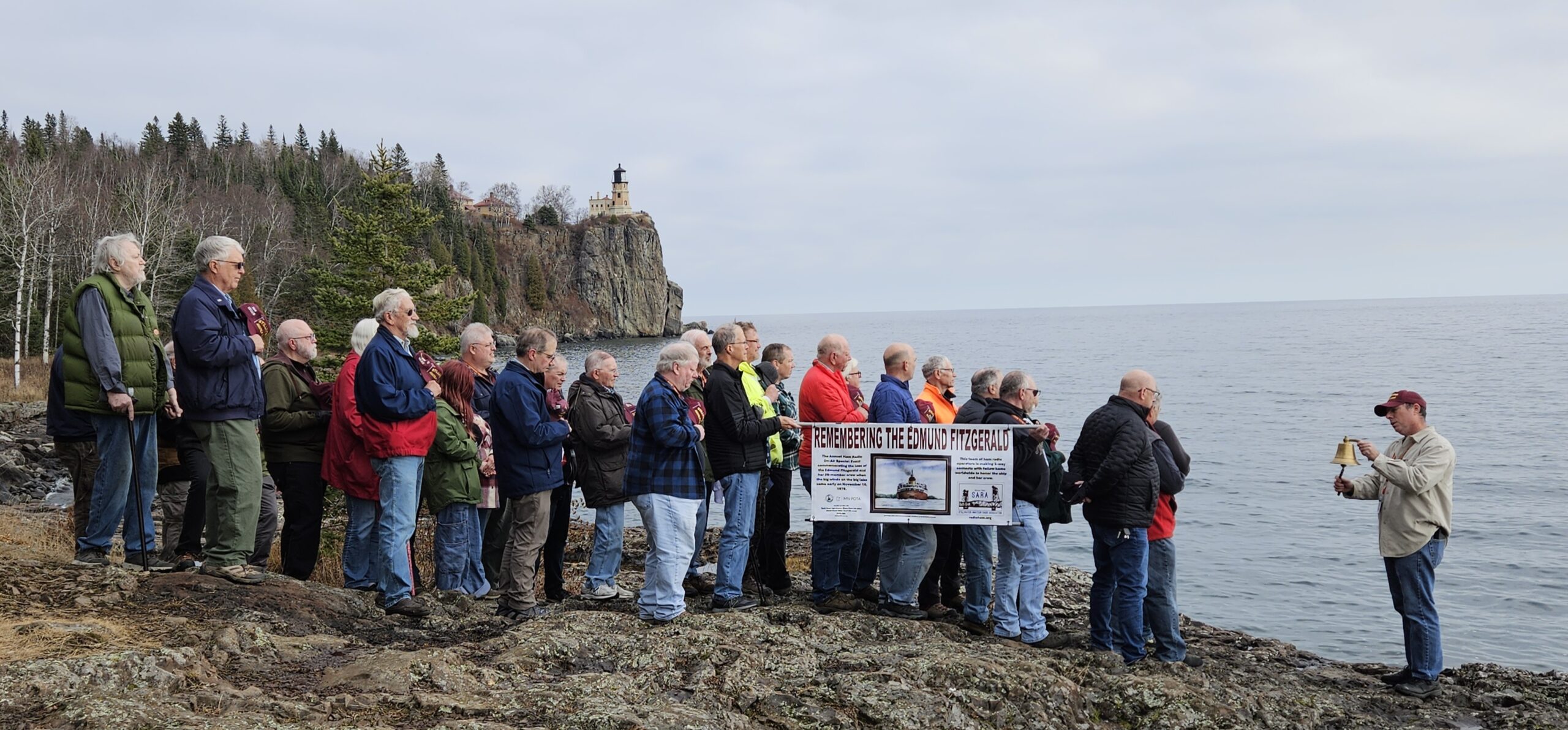 SARA members conduct a solemn bellringing ceremony for the crew of the Edmund Fitzgerald at Split Rock Lighthouse State Park